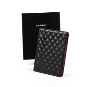 CHANEL, A BLACK LAMB SKIN O-TECH HOLDER