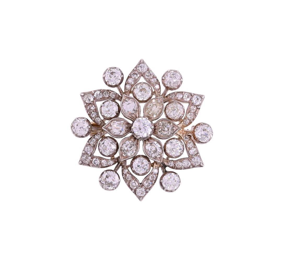 A LATE VICTORIAN AND LATER DIAMOND FLOWER HEAD CLUSTER BROOCH