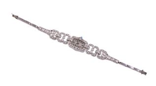 AN ART DECO DIAMOND COCKTAIL WATCH CIRCA 1930