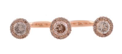 A TRIPLE CLUSTER TINTED DIAMOND HAND ORNAMENT