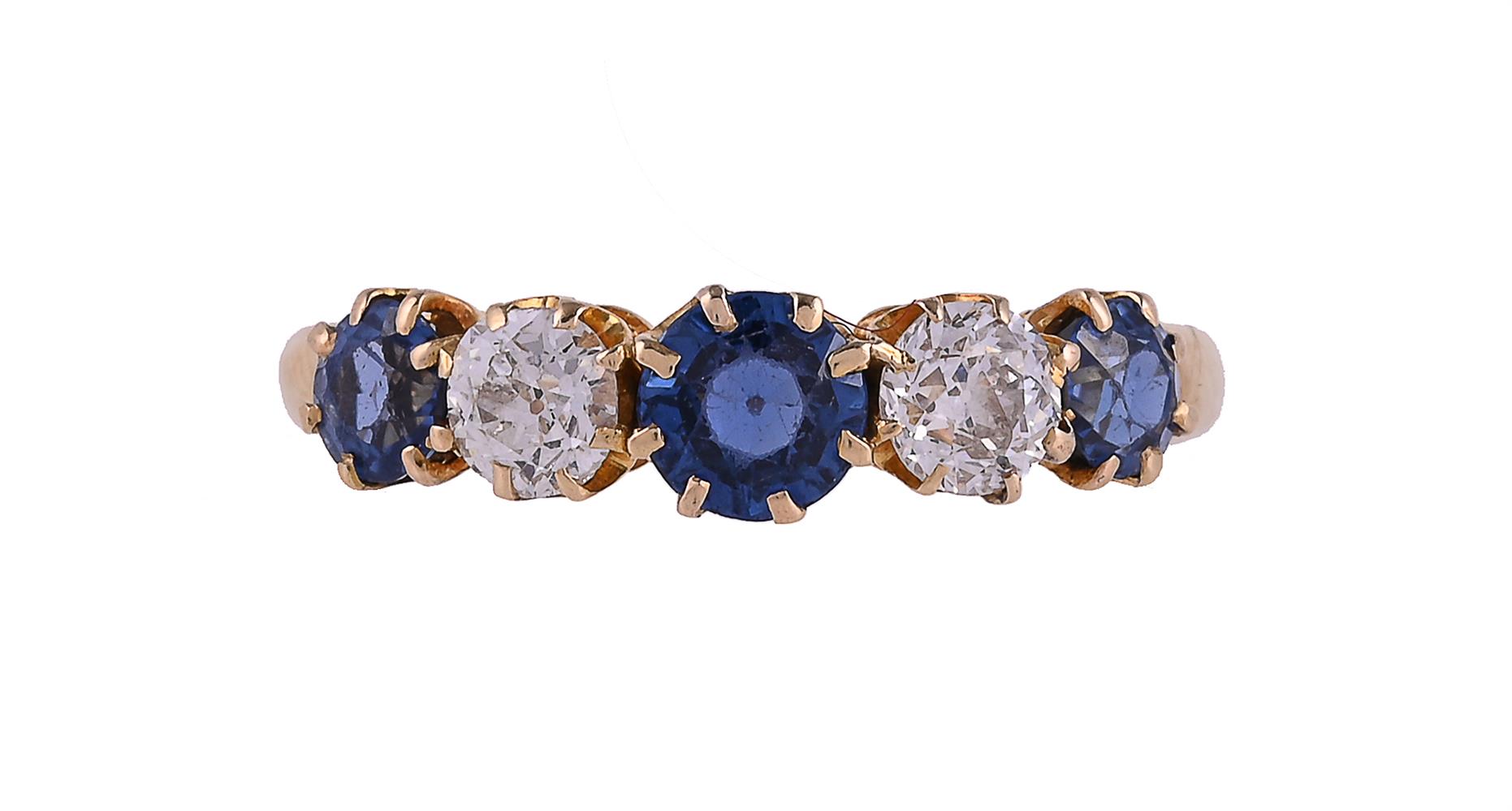A SAPPHIRE AND DIAMOND FIVE STONE RING
