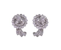 A PAIR OF MID 20TH CENTURY DIAMOND EAR STUDS