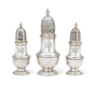 A SET OF THREE GEORGE II BALUSTER CASTORS