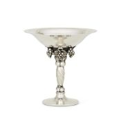 GEORG JENSEN, A DANISH SILVER COLOURED GRAPE PATTERN PEDESTAL BOWL