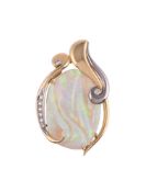 A CARVED OPAL AND DIAMOND PENDANT