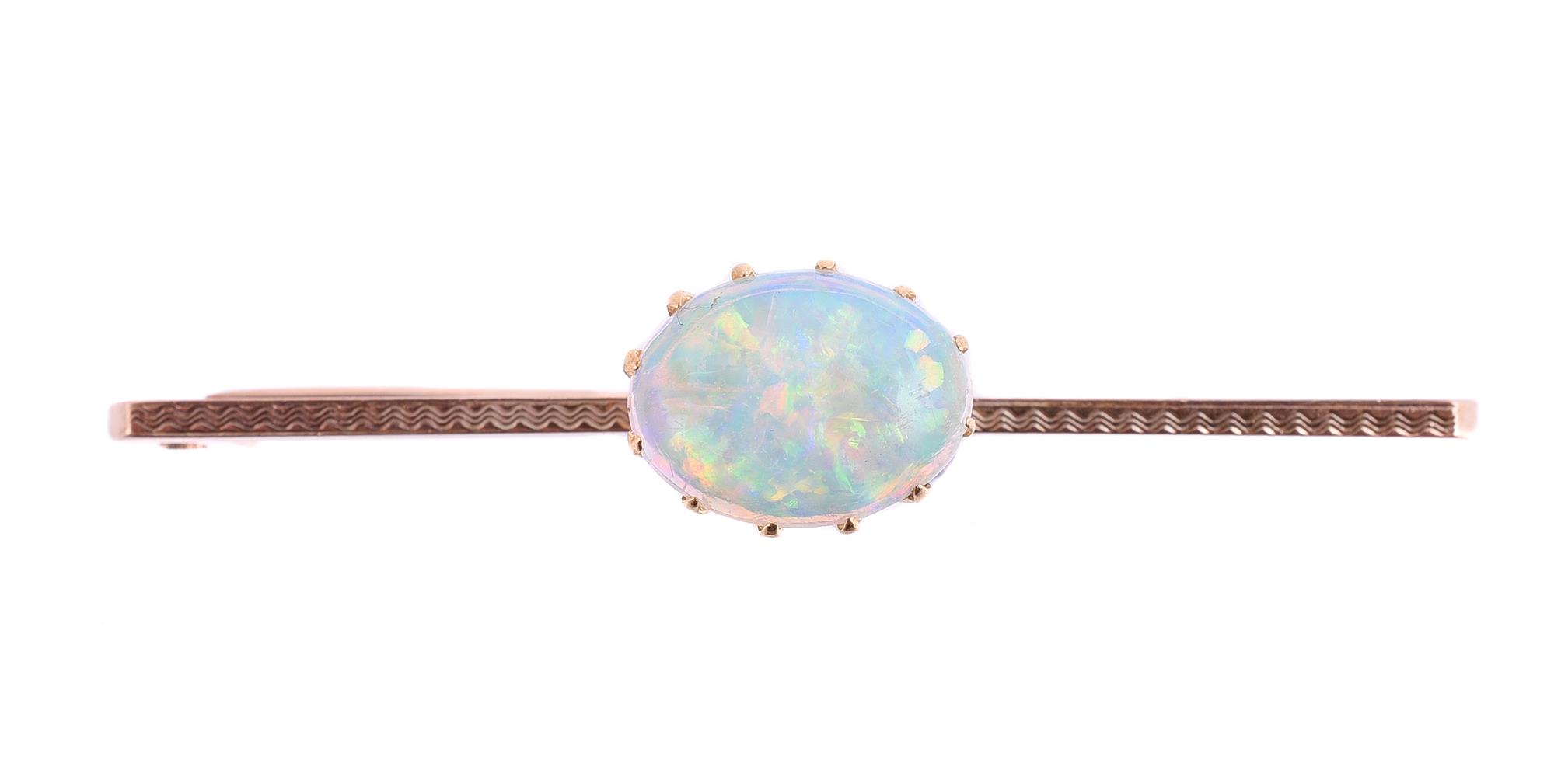 AN OPAL BAR BROOCH