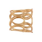 A GOLD COLOURED CUFF BANGLE