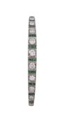 A 1920S EMERALD AND DIAMOND BRACELET