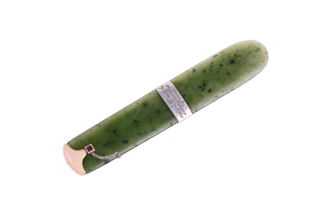 AN EARLY 20TH CENTURY NEPHRITE, ENAMEL, RUBY AND DIAMOND PAPERKNIFE - Image 1 of 2