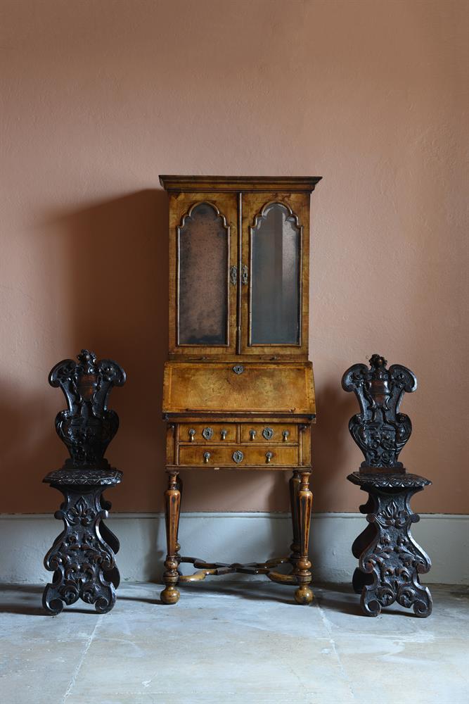 A QUEEN ANNE WALNUT AND FEATHER BANDED BUREAU CABINET, CIRCA 1705