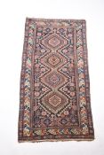 A DAGESTAN CARPET, approximately 258 x 129cm