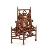 A MAHOGANY AND BRASS FOLDING CANTERBURY, AESTHETIC MOVEMENT, LATE 19TH CENTURY