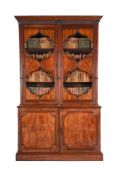 AN UNUSUAL GEORGE III MAHOGANY AND EXOTIC HARDWOOD BOOKCASE, POSSIBLY ANGLO-CHINESE, CIRCA 1800