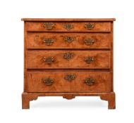 A GEORGE II WALNUT CHEST OF DRAWERS, MID 18TH CENTURY