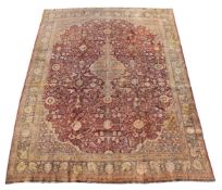 A TABRIZ CARPET, approximately 380 x 278cm