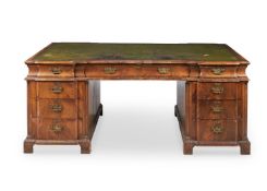 A WALNUT INVERTED BREAKFRONT PARTNER'S DESK, BY MAPLE & CO, 20TH CENTURY