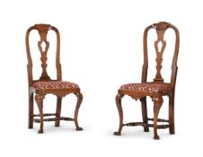 AN UNUSUAL PAIR OF WALNUT SIDE CHAIRS, CIRCA 1730-50