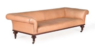 A VICTORIAN WALNUT AND LEATHER UPHOLSTERED SOFA, IN THE MANNER OF HOLLAND & SONS, LATE 19TH CENTURY