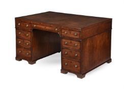 A GEORGE III MAHOGANY PARTNER'S PEDESTAL DESK, CIRCA 1800