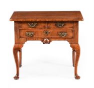 A GEORGE II WALNUT AND FEATHER BANDED SIDE TABLE OR LOWBOY, CIRCA 1740