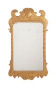 A GEORGE II GILT GESSO WALL MIRROR, CIRCA 1740