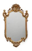 A GILT GESSO WALL MIRROR, IN REGENCE STYLE, CIRCA 1870
