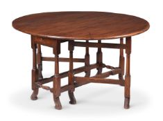 A WILLIAM III FRUITWOOD GATELEG DINING TABLE, CIRCA 1700