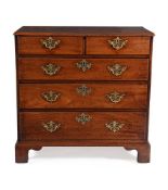 A GEORGE II WALNUT CHEST OF DRAWERS, CIRCA 1745