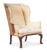 A GEORGE II WALNUT WING ARMCHAIR, CIRCA 1740
