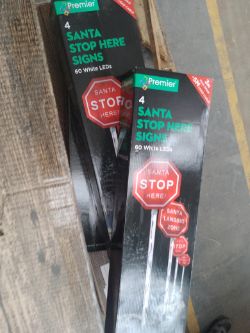 1 Pallet containing Appears New 11 x Christmas trees, 3 x Santa stop signs and 1 door arch