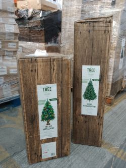 1 Pallet of returned & New Christmas trees - various sizes