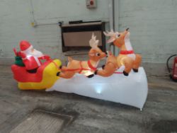 1 Pallet of Appears new assorted Christmas lights & decorations Blow up Santa Christmas trees & More