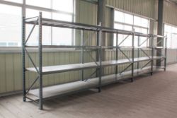 4 bay run of 600mm deep shelf / parcel racking - 5 uprights - 32 beams - 16 boards