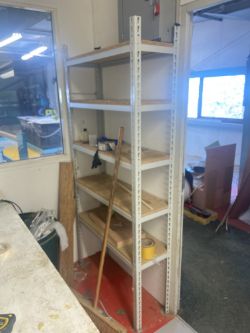 1 bay of pallet racking 2000mm x2450mm - 1 bay of grey racking 900mm x2000mm - 1 x yellow cabinet