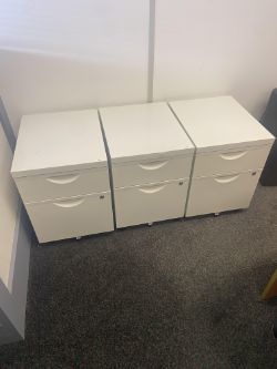 5 x white filing cabinets and white double door cabinet