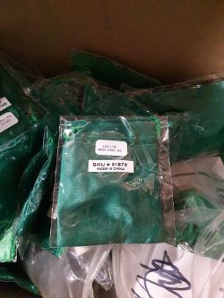 Green broach approximately 700 box no 175