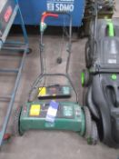 Battery powered lawnmower lawnmower with charger