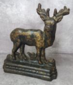 A 19th century iron door stop in the form of a stag, gilt patina c.1880