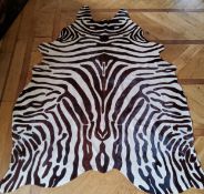 A Zebra skin rug