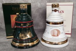 Two Bell's Old Scotch Whisky Christmas bell shaped decanters produced by Wade, the green bell shaped