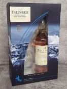 A Talisker 10 year single malt Scotch whisky presentation set, Isle of Skye. Excellent condition