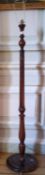 An Edwardian mahogany standard lamp, reeded column