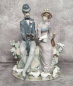 A Lladro porcelain 'A Quiet Afternoon' figure group printed marks, no. 5843, 32cm high