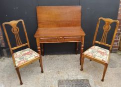 A Regency style swivel action tea table with a pair of Arts & Crafts chairs, Table H77 x W46 (92