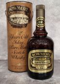 A bottle of Bowmore 12 Year Old Islay Pure Malt Scotch Whisky, 1980's bottling, 1 litre, 43% vol. in