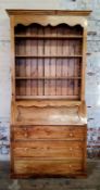 A 19th century English farmhouse pine bureau bookcase. Height 230cm x width 107cm x depth 50.5cm,