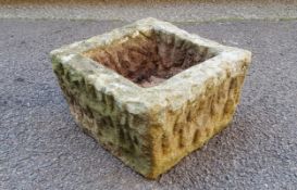 A small Derbyshire gritstone trough .