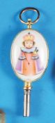 Golden pocket watch key with two painted porcelain medallions, 14 ct. gold setting, colourfully pain