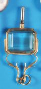 Gold pocket watch key, 14 ct. Gold setting with rectangular citrine