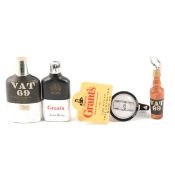 Collection of assorted whisky related items, optics, and bar-top accessories